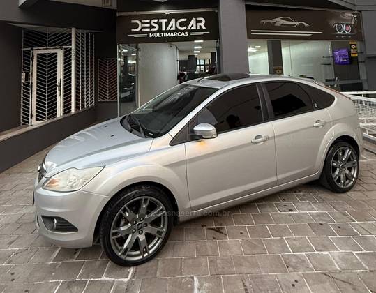 FORD FOCUS 2.0 GHIA SEDAN 16V FLEX 4P MANUAL